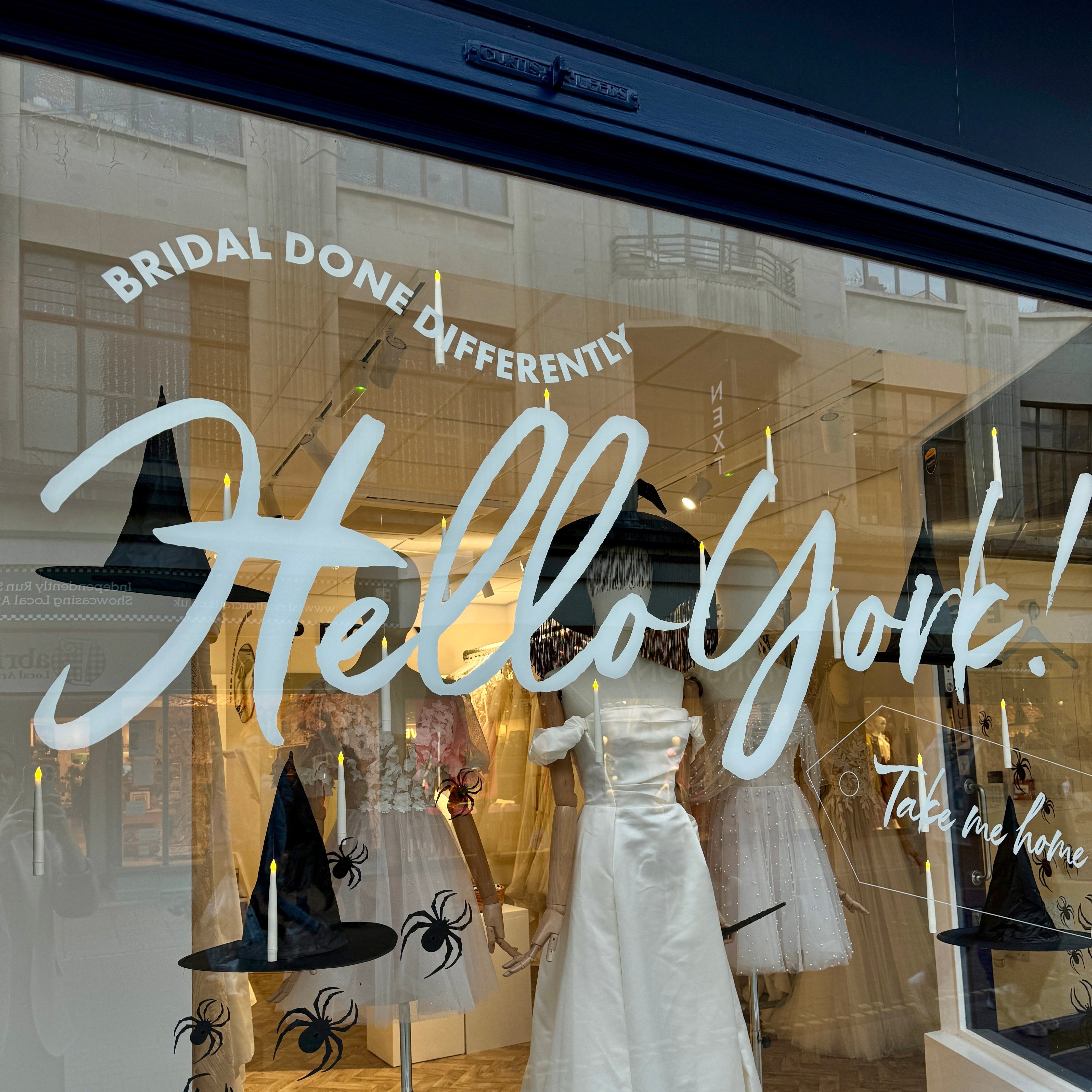 Photo of Peggy Bridal's Bridal outlet in York, featuring elegant bridal gowns on display in the storefront window. Photo of Peggy Bridal's Bridal outlet in York, featuring elegant bridal gowns on display in the storefront window.