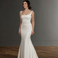 Sleek wedding gown featuring a square neckline, fitted bodice, and a flowing mermaid skirt with a subtle train, perfect for the bride seeking a modern and minimalist bridal look.