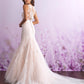 Elegant mermaid wedding dress with intricate lace detailing, featuring a halter neckline and a romantic tulle skirt. Perfect for the bride seeking a blend of sophistication and timeless beauty.