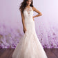 Elegant mermaid wedding dress with intricate lace detailing, featuring a halter neckline and a romantic tulle skirt. Perfect for the bride seeking a blend of sophistication and timeless beauty.