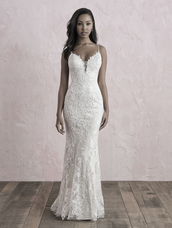 Elegant lace wedding dress with a fitted silhouette, featuring a deep V-neckline and intricate floral detailing, perfect for a bride seeking timeless beauty and sophistication.