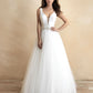 Stunning ball gown wedding dress featuring a deep V-neckline and a tulle skirt, accented with a jeweled waistband for added elegance. Ideal for brides seeking a classic yet glamorous look.