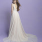 Chic A-line wedding dress with a plunging V-neck, lace bodice, and soft tulle skirt, creating an effortlessly romantic bridal style.