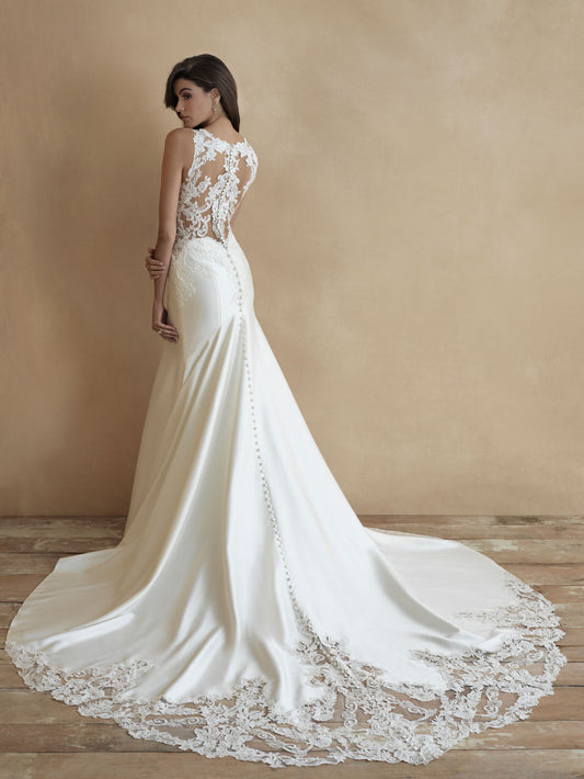 Sleek mermaid wedding dress with lace bodice, plunging V-neckline, and fitted silhouette. Perfect for modern brides seeking a sophisticated and figure-flattering bridal gown.