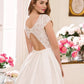 Back view of a wedding gown with a lace keyhole back, cap sleeves, and a full A-line skirt, offering a perfect blend of elegance and modern style for the sophisticated bride.