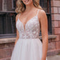 Modern wedding gown with a plunging lace bodice, thin spaghetti straps, and a flowing skirt, ideal for the bride seeking a blend of elegance and contemporary style.