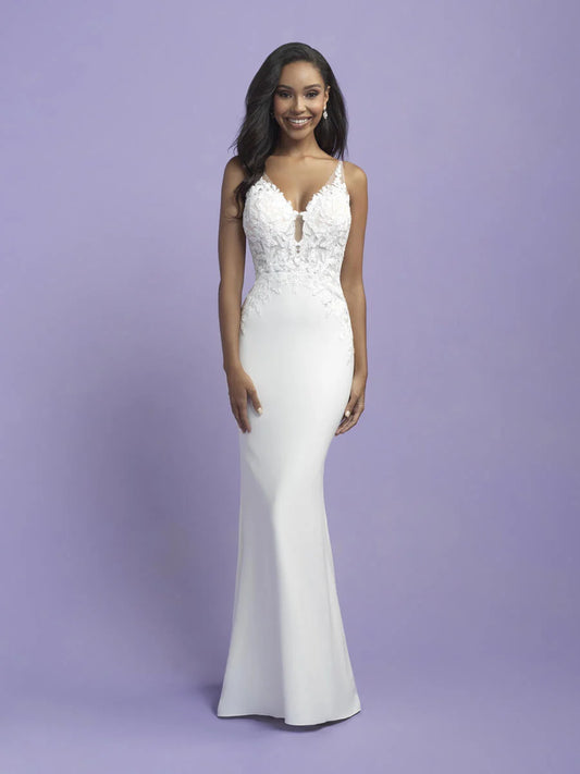 Sleek sheath wedding dress with delicate lace bodice and keyhole neckline, designed to enhance the bride's natural elegance and charm.