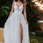 Romantic wedding dress with deep V-neck, lace bodice, and thigh-high slit, perfect for a modern bride seeking elegance and allure for her outdoor or destination wedding.
