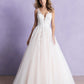 Stunning bridal gown with a deep V-neckline, delicate lace bodice, and a full tulle skirt, designed for the bride seeking a classic yet modern look on her special day.